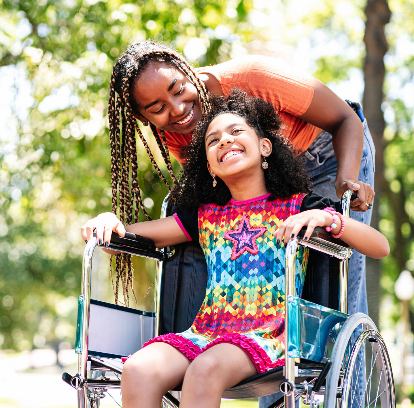 Close up of hands planting a sequoia tree in the wild