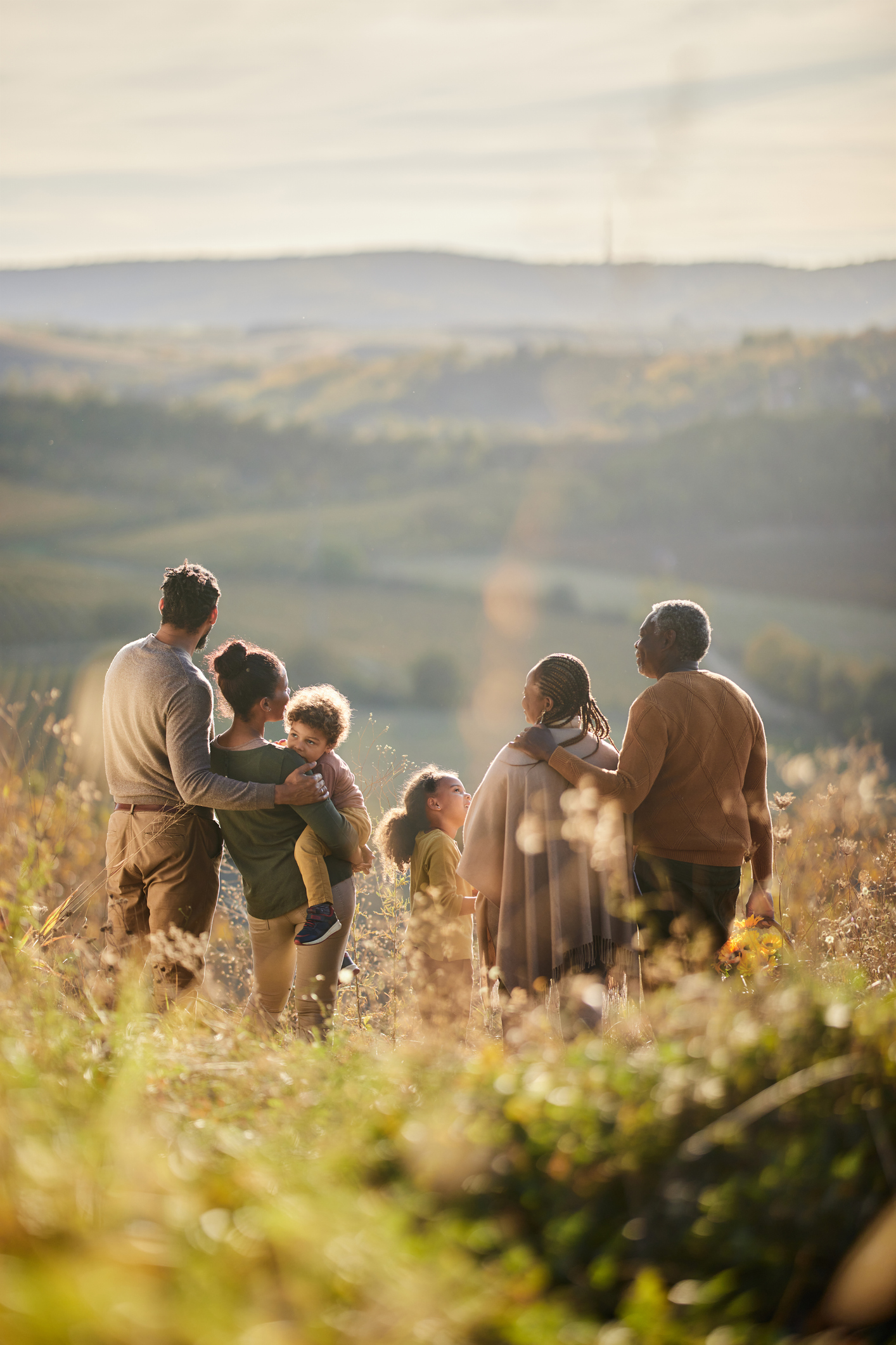 Close up of hands planting a sequoia tree in the wild